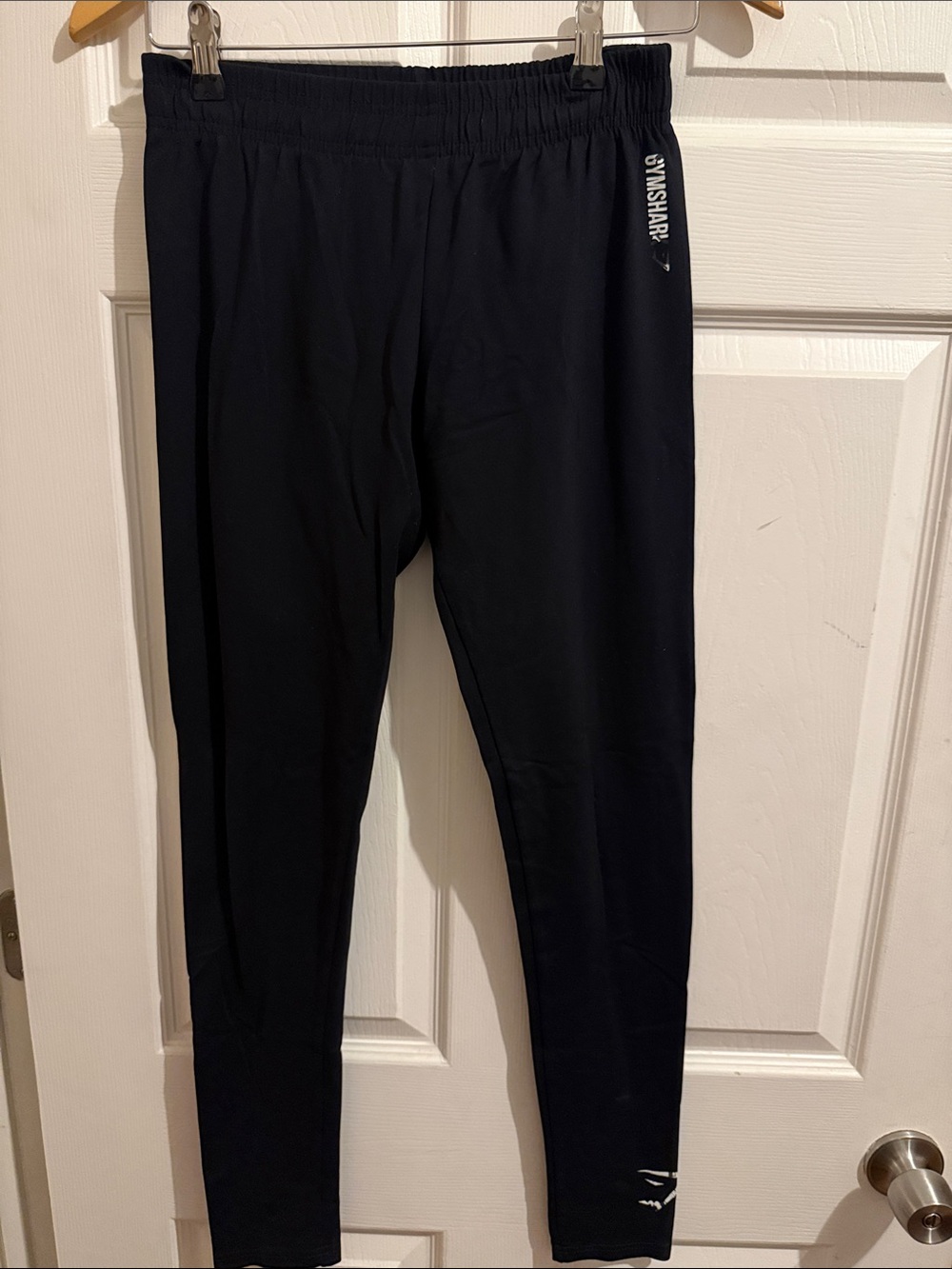 Women’s Gymshark Black Athletic Leggings with peeling Logo